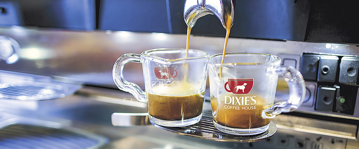 The alluring aroma of freshly made espresso fills the air.